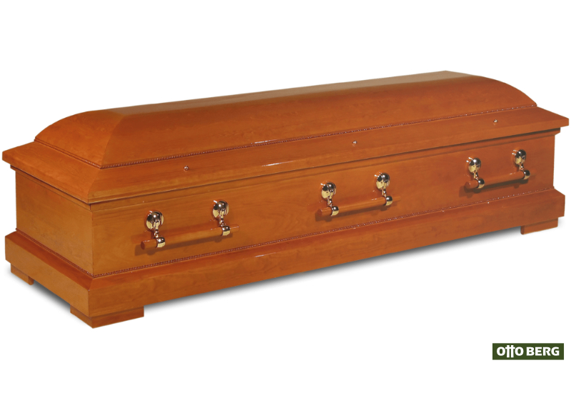 Kiefernsarg 40 - Amital - Sarg aus astfreiem Kiefernholz mit Holz- stangengriffen in Messinghaltern. Oberfläche: kirschholzfarben gebeizt, glanzlackiert.
